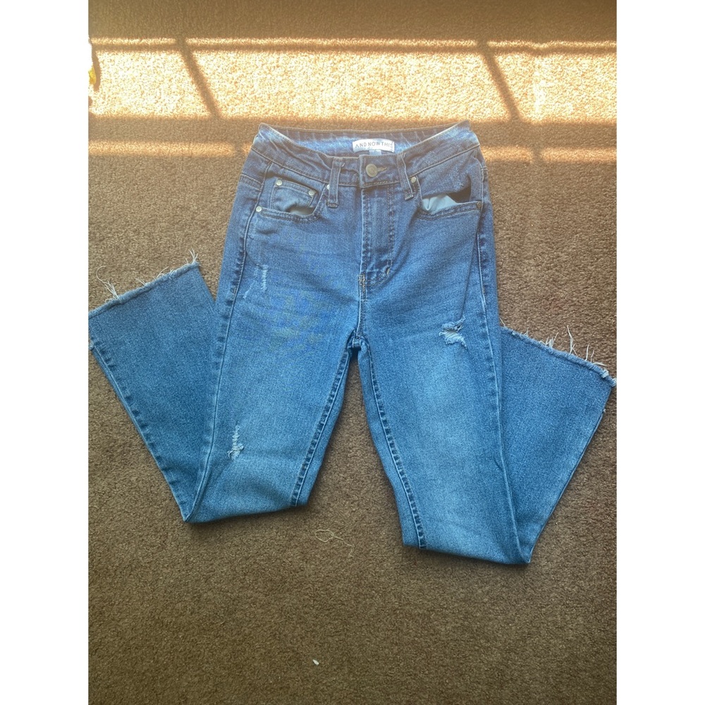 Light wash light distress jeans